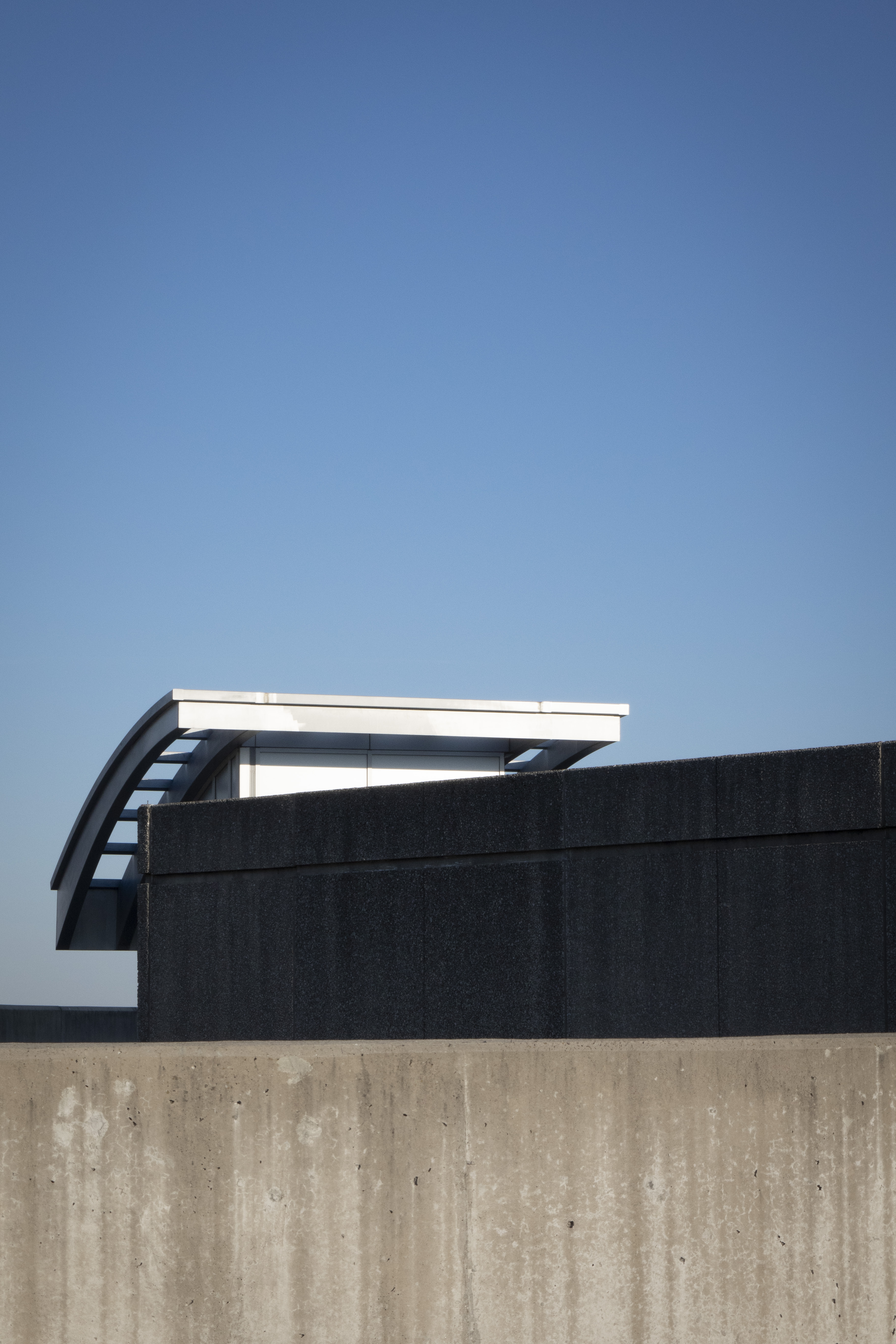 Between Concrete And Blue Sky